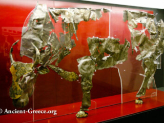 Fragments of an ancient statue made of silver and gold