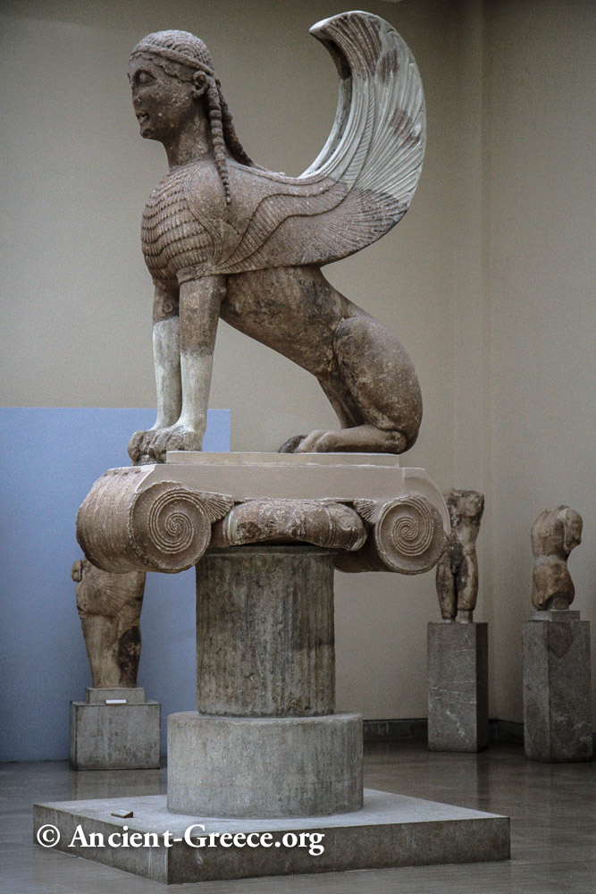 Stone sculpture of Sphinx sitting on an Ionic column