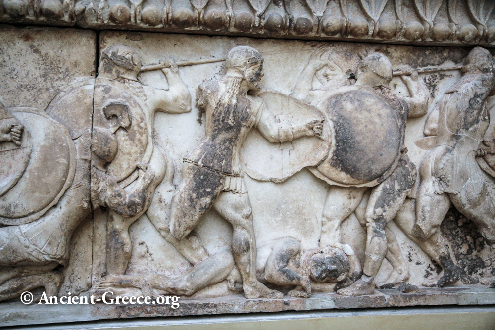 Detail of sculptures from the north frieze with warriors fighting over a fallen body