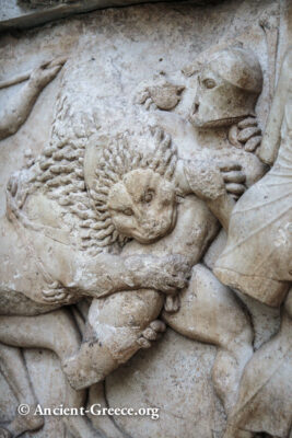 Relief sculpture of a lion biting a warrior from the Siphnian Treasury