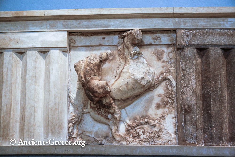 Tholos Metope: Warrior Mounting a Horse Metope detail from the Tholos.