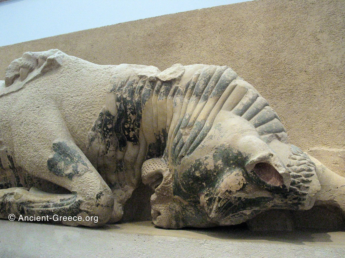 Bull attacked by two lions pediment sculpture