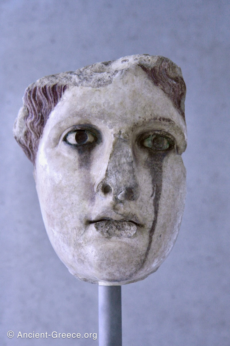 Head of an acrolithic female statue with inlaid eyes