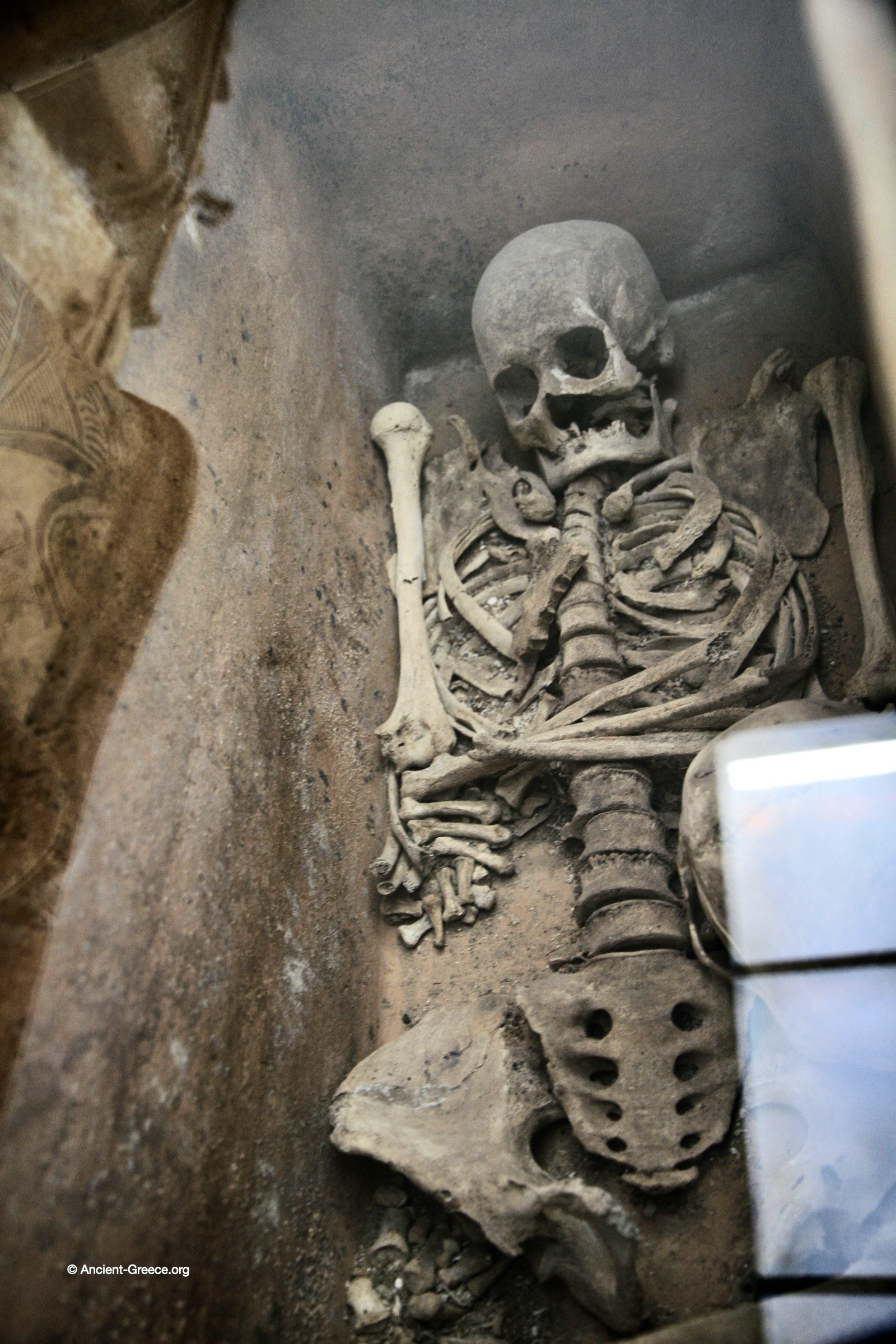 Human skeleton inside a Minoan larnax.  Exhibited in the Agions Nikolaos Archaeological Museum