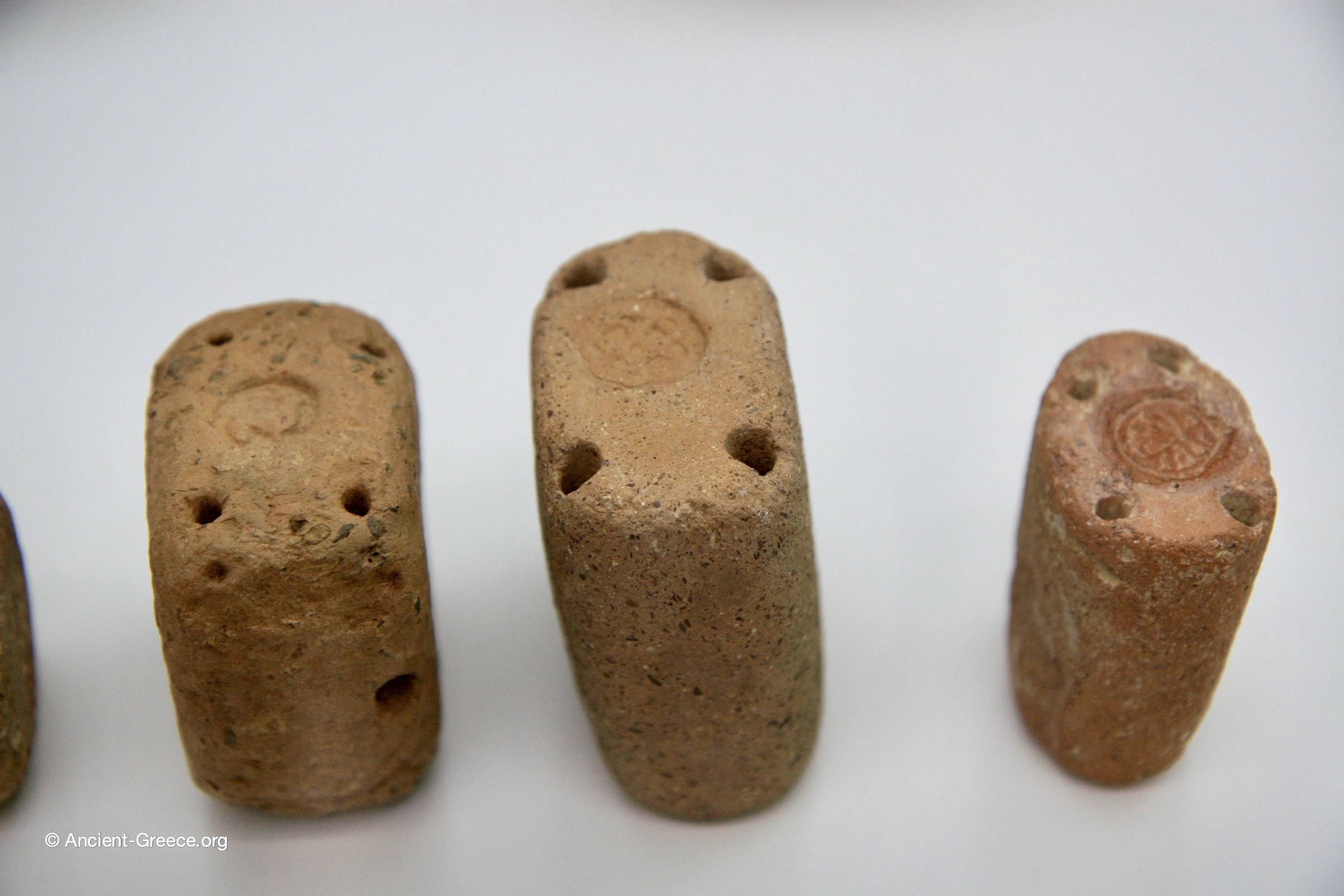 Detailed view of terracotta loom weights