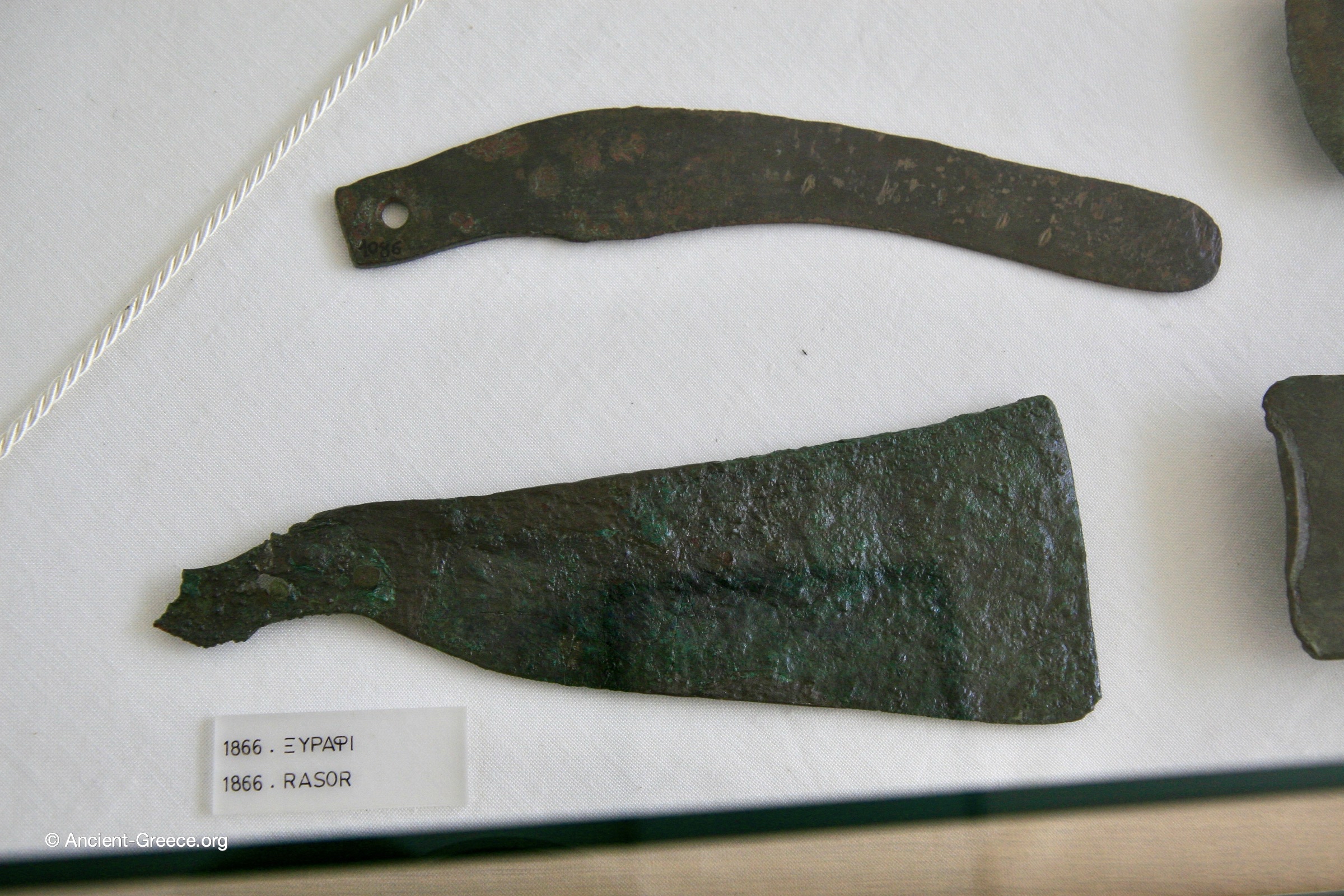 Bronze razors from the Late Minoan period  Exhibited in the Agions Nikolaos Archaeological Museum