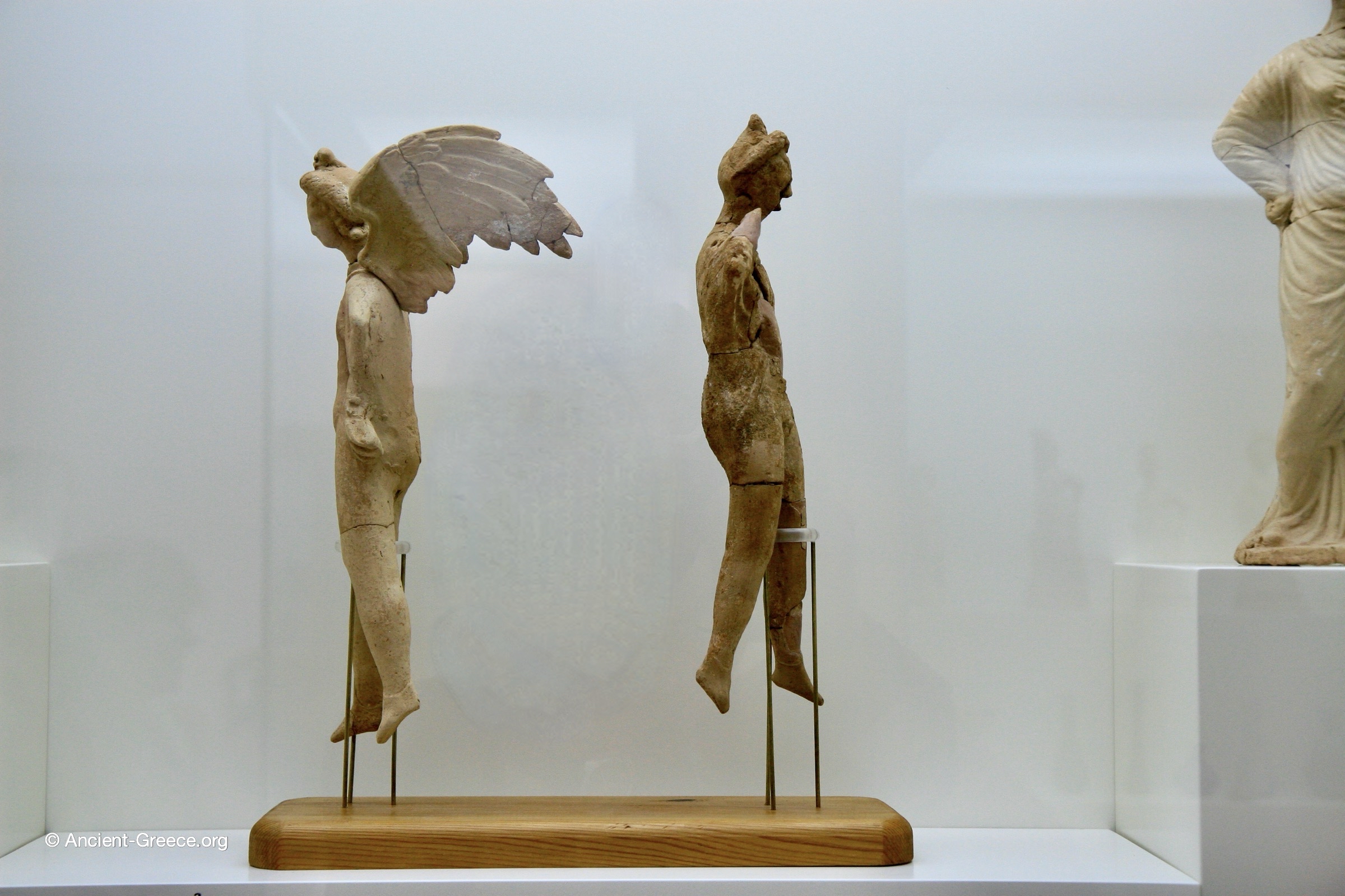 Terracotta figurines of winged Eros