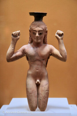 Perfume bottle in the form of a kneeling athlete knotting the diadem