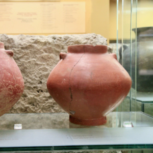 Two burnished conical jars.
