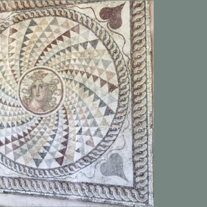 Mosaic floor of a house depicting the head of Medusa.