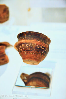 Early Greek writing inscription on a cup