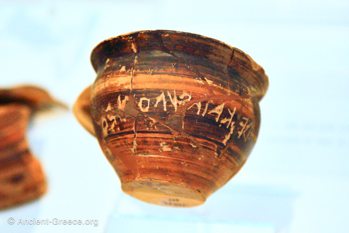 Early Greek writing inscription on a cup