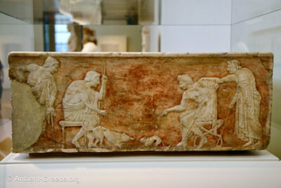 Base of Kouros with Athletes Relief with two seated youths pair a dog and a cat in a fight