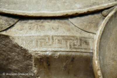 Ionic column capital with painted decoration detail