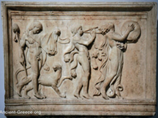Maenad and two satyrs in a Dionysiac procession sculpture