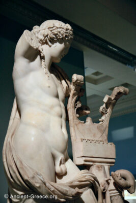 Apollo holding a kithara statue