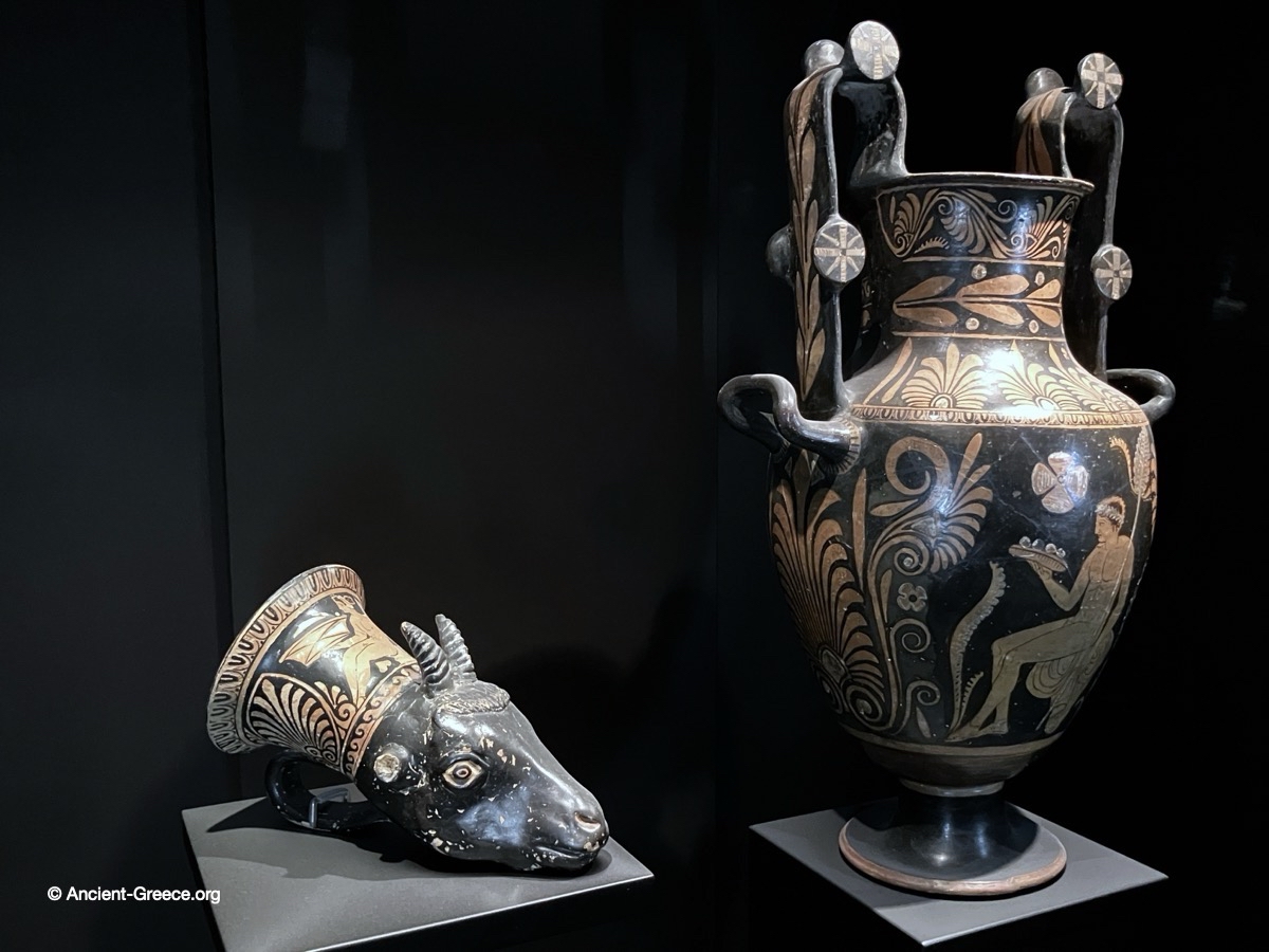 Greek goat-shaped vessel (rhyton), and amphora.