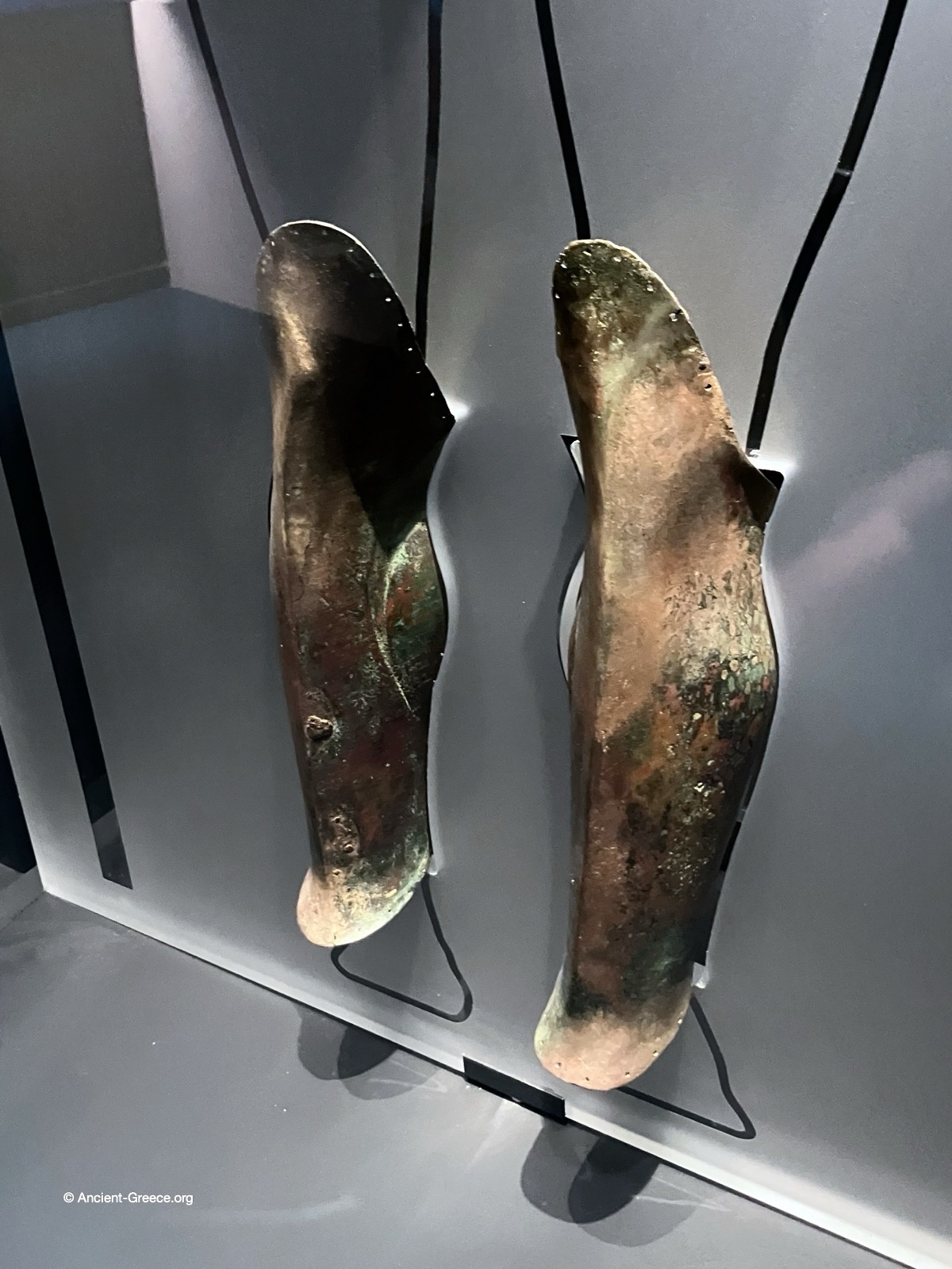 Ancient Greek bronze greaves . Hoplite armor.