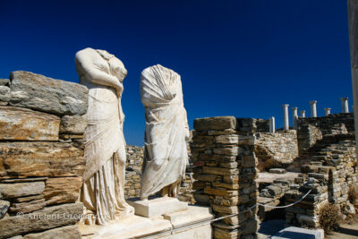 Two replicas of male and female statues