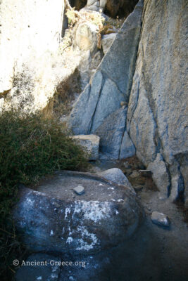 Round stone altar in the entrance of Cynthus cave.