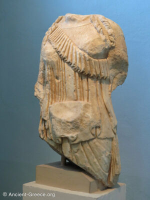 Kore wearing an obliquely draped Ionian himation and a chiton