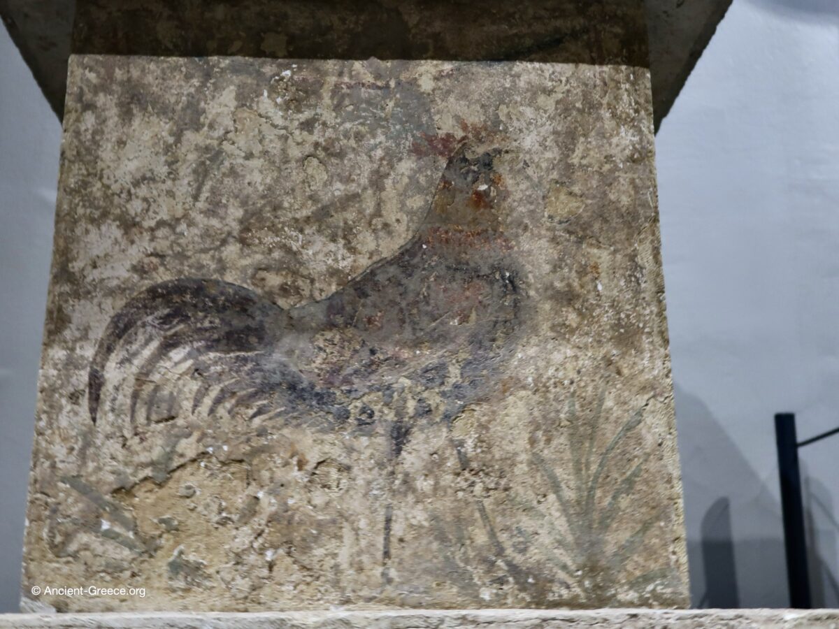 Closeup of the rooster painting on the altar