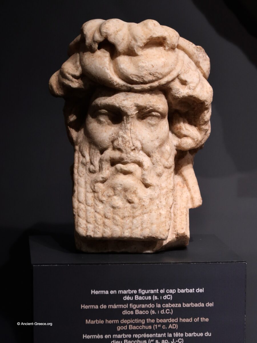 Sculpted head in stone.