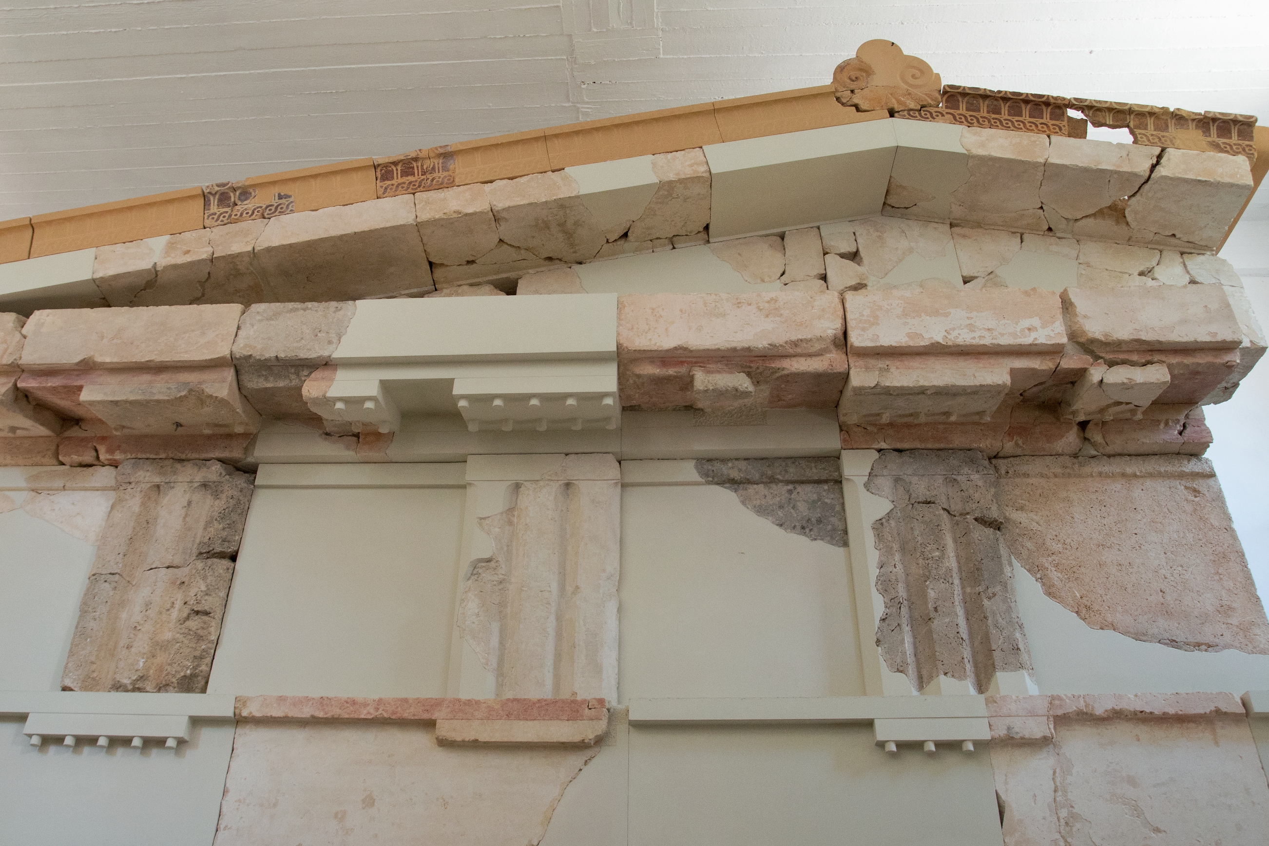Old Temple of Aphaia facade showing triglyphs, metopes, and pediment.