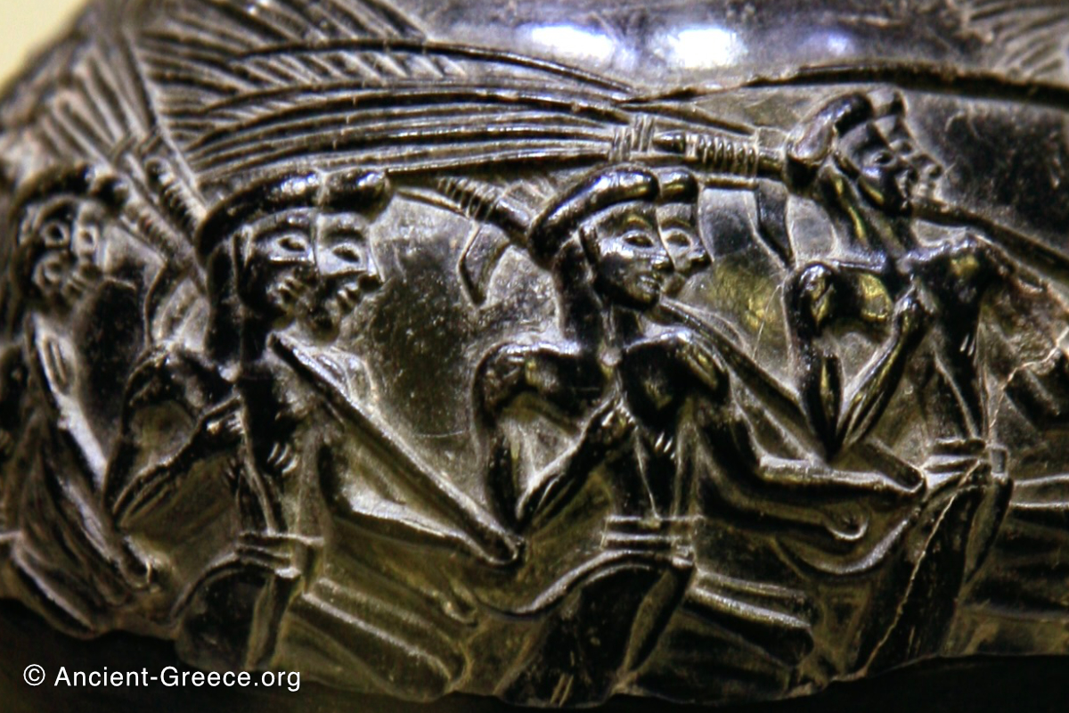 Harvester Vase (or Harvester Rhyton) detail of farm workers walking with sticks over their shoulders