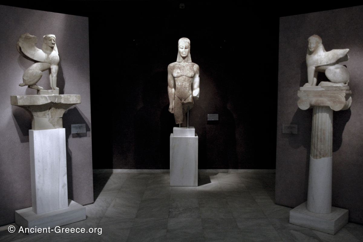 sculpture of kouros and two sphinxes