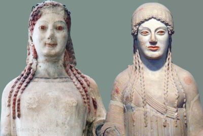 Two Kore statues, the earlier one with as smile, the later one with a frown.