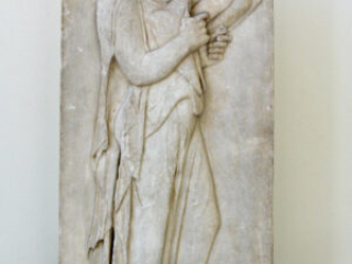 Grave stele of girl kissing her pet doves