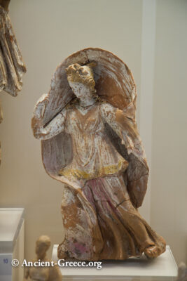 Dancing woman clay statuette