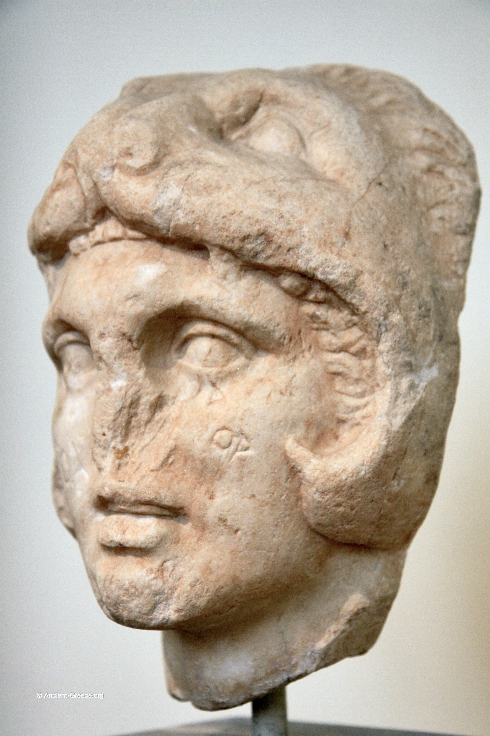 Head of Alexander the Great. Ancient Greek art on exhibit in the National Archaeological Museum in Athens, Greece.