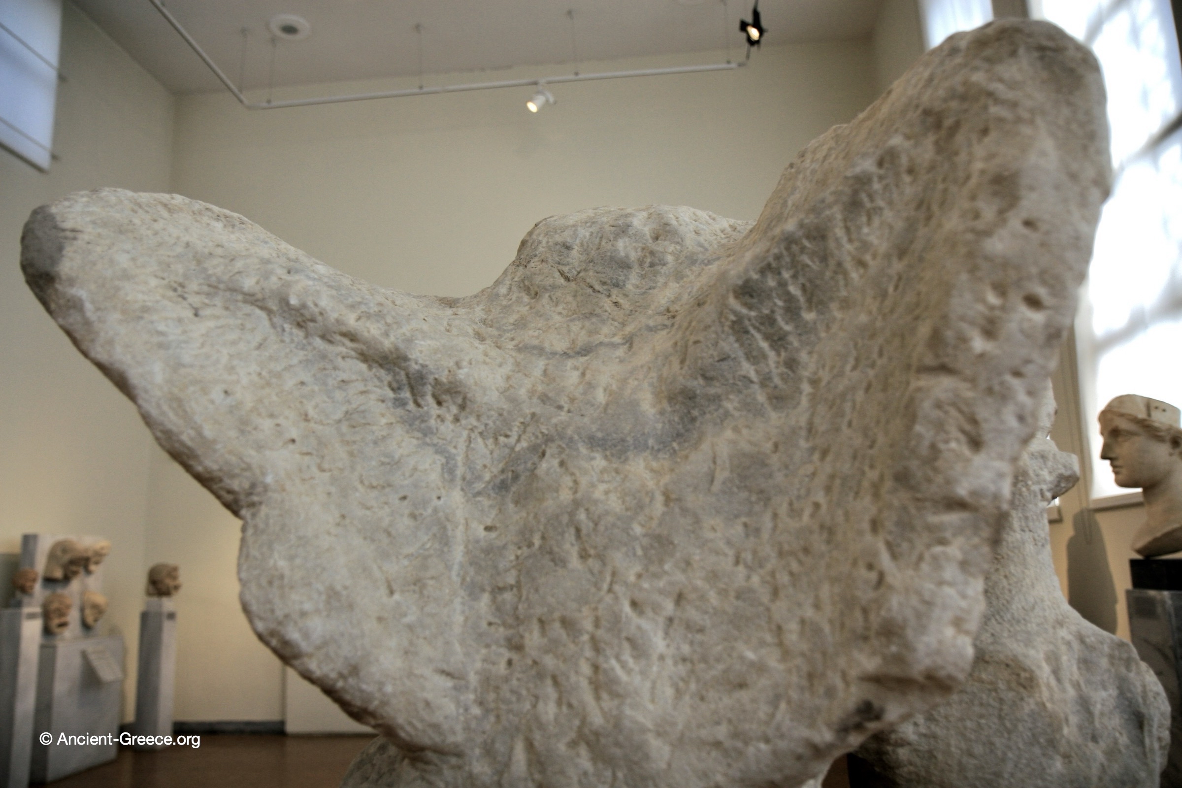 Ancient Greek art on exhibit in the National Archaeological Museum in Athens, Greece. Unfinished funerary statue of a sphinx.