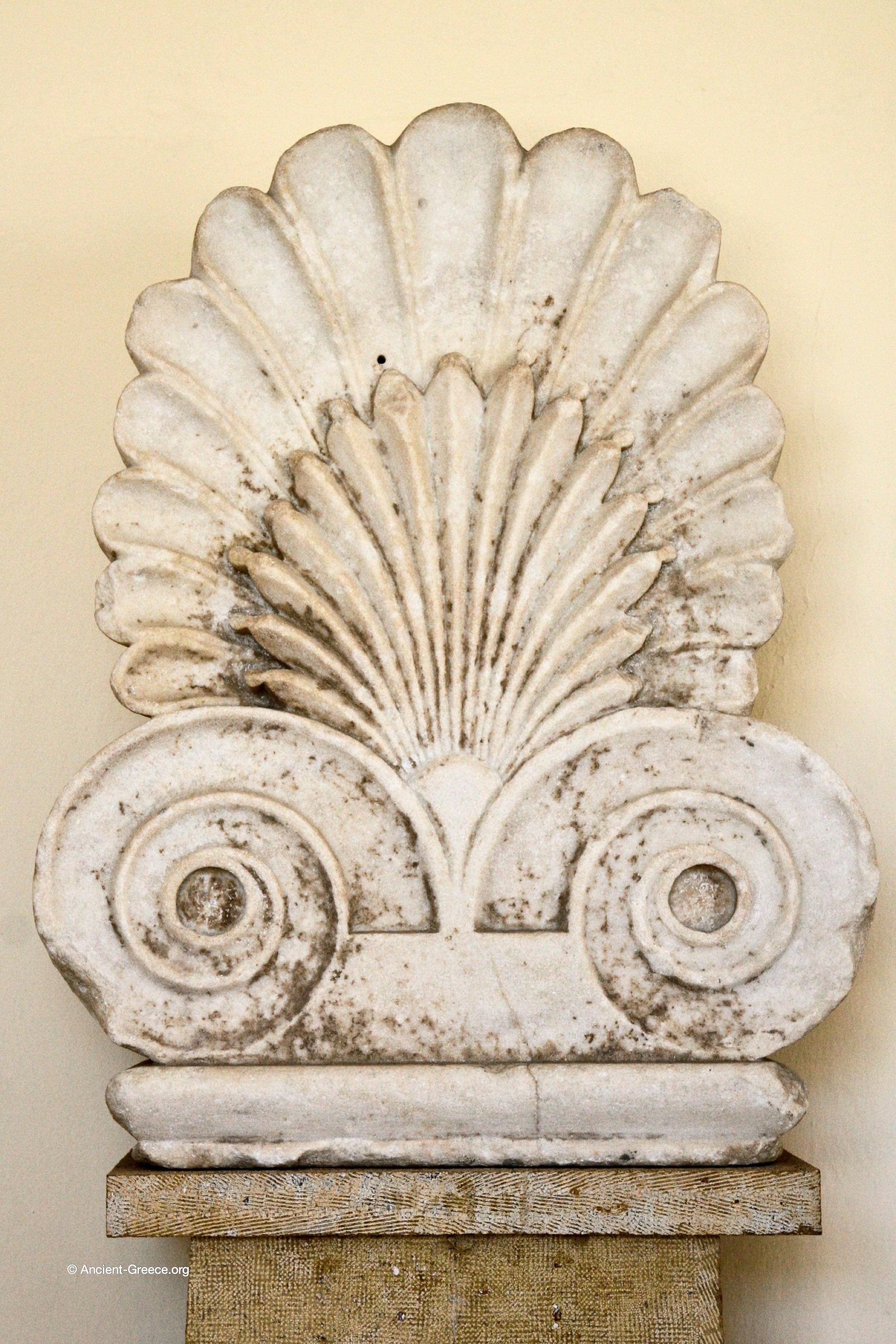 Palmette relief.