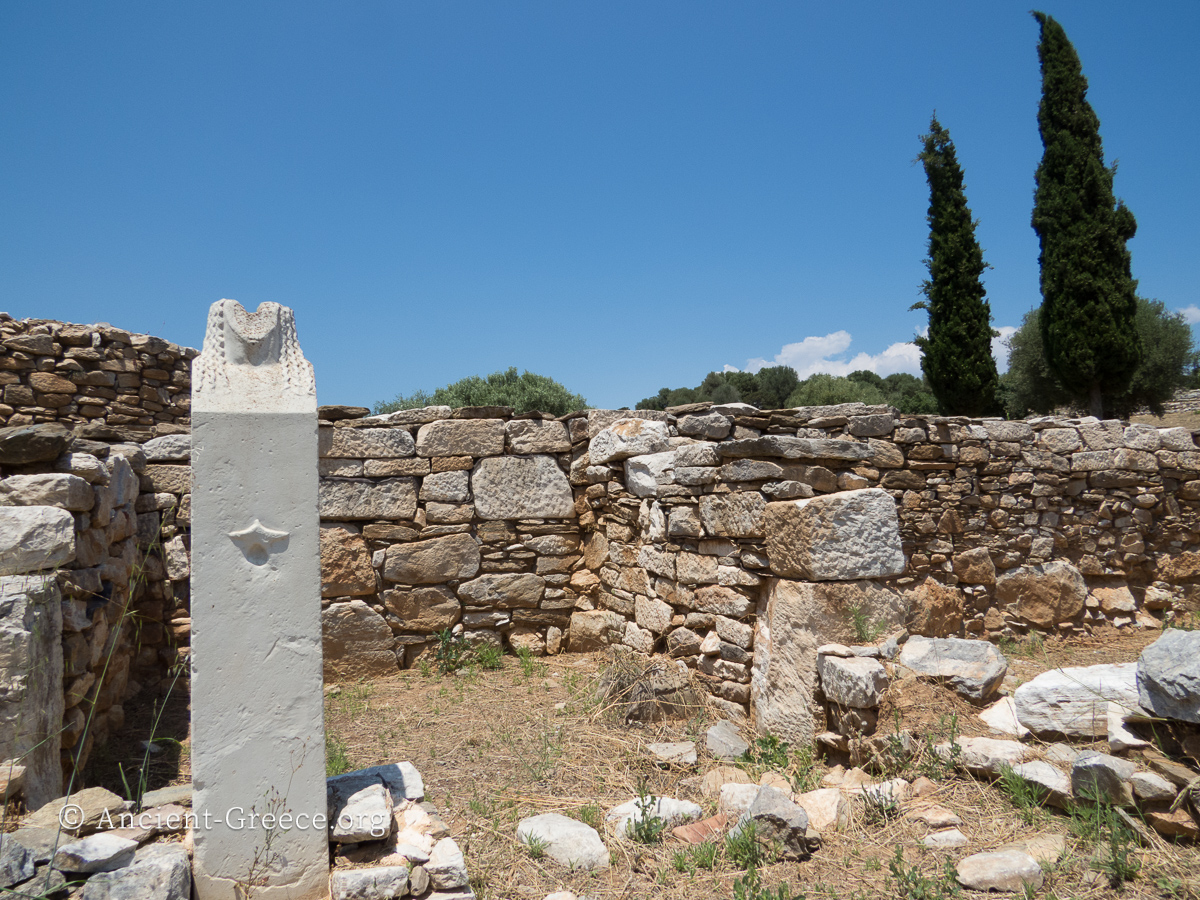 Stone ruins and a damaged statue