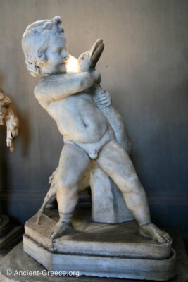 Sculpture of a boy fighting with a goose