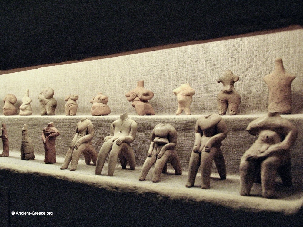 Female and male clay figurines