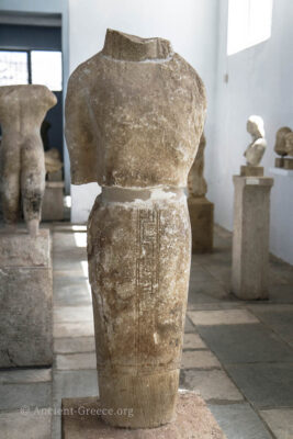 Fragmented marble statue of Kore.